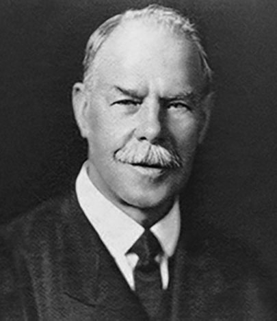 a vintage black & white close up portrait of evangelist Smith Wigglesworth